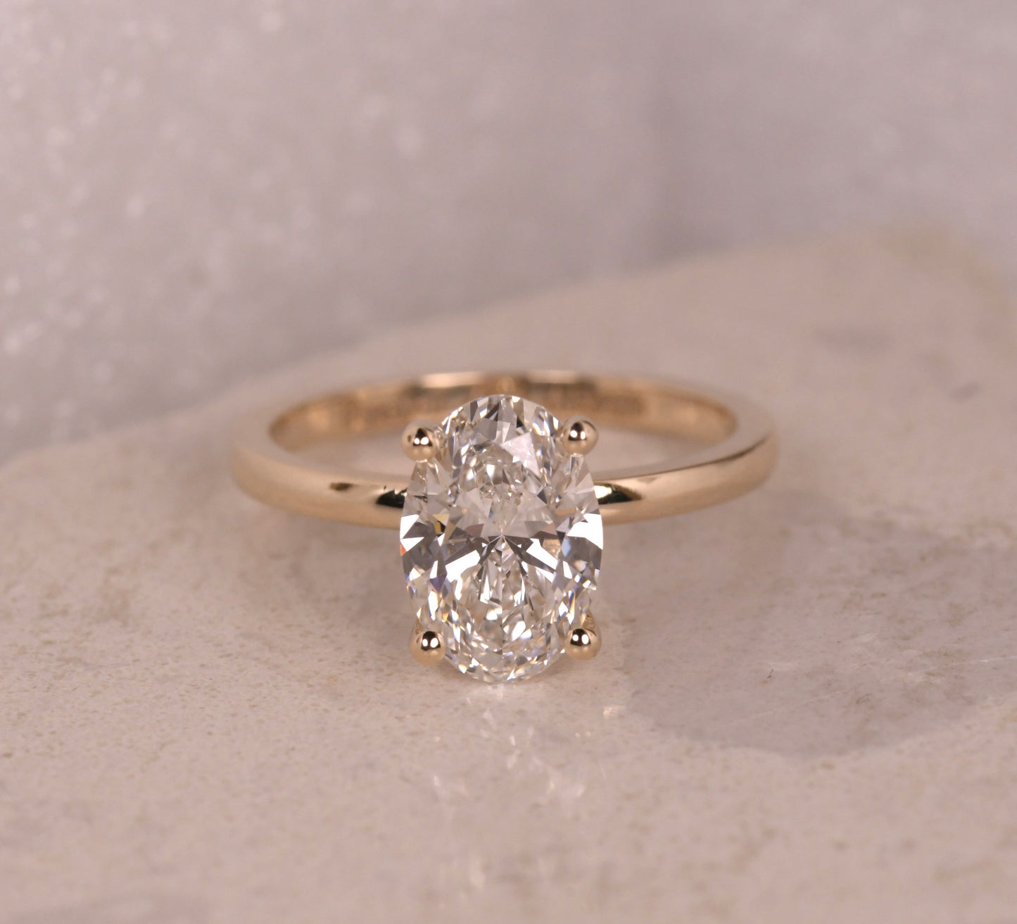 Oval Solitaire Hidden Halo Diamond Ring