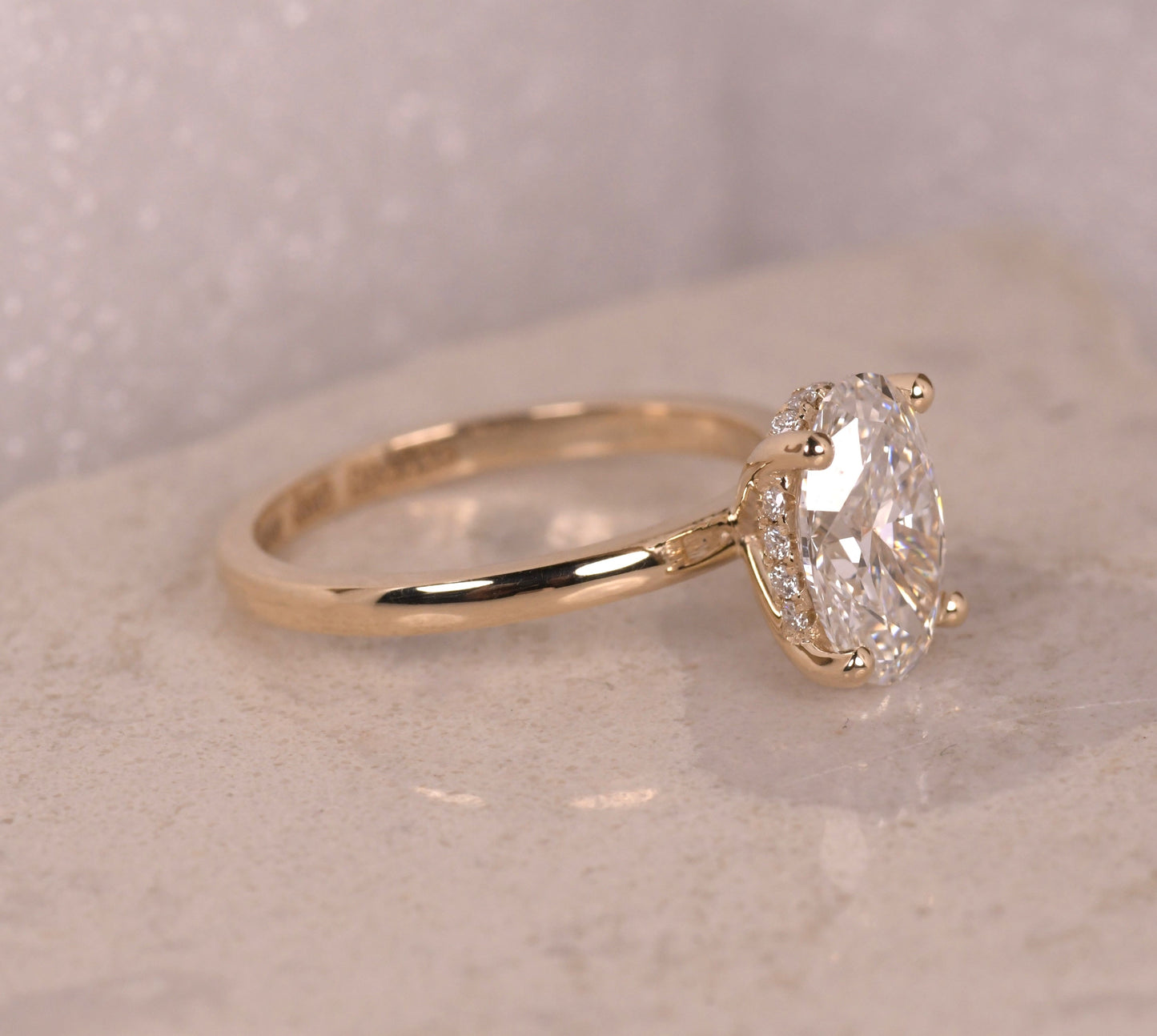 Oval Solitaire Hidden Halo Diamond Ring