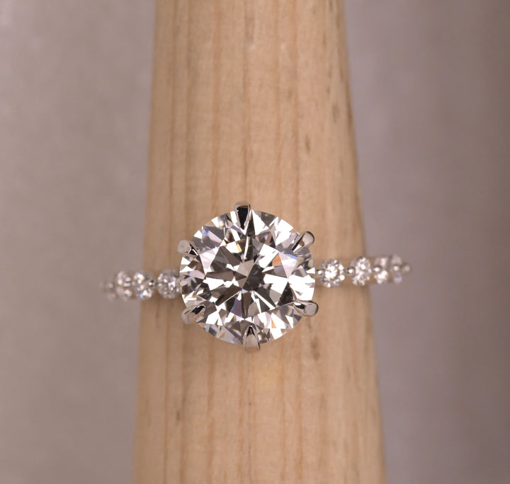 Round Cut Side Diamond Accent Engagement Ring