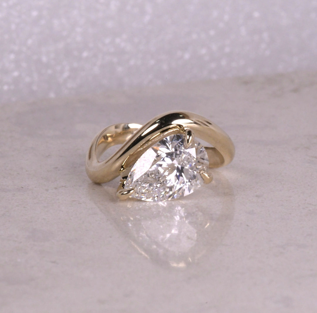 Pear Cut Lab Diamond Curved Solitaire Ring