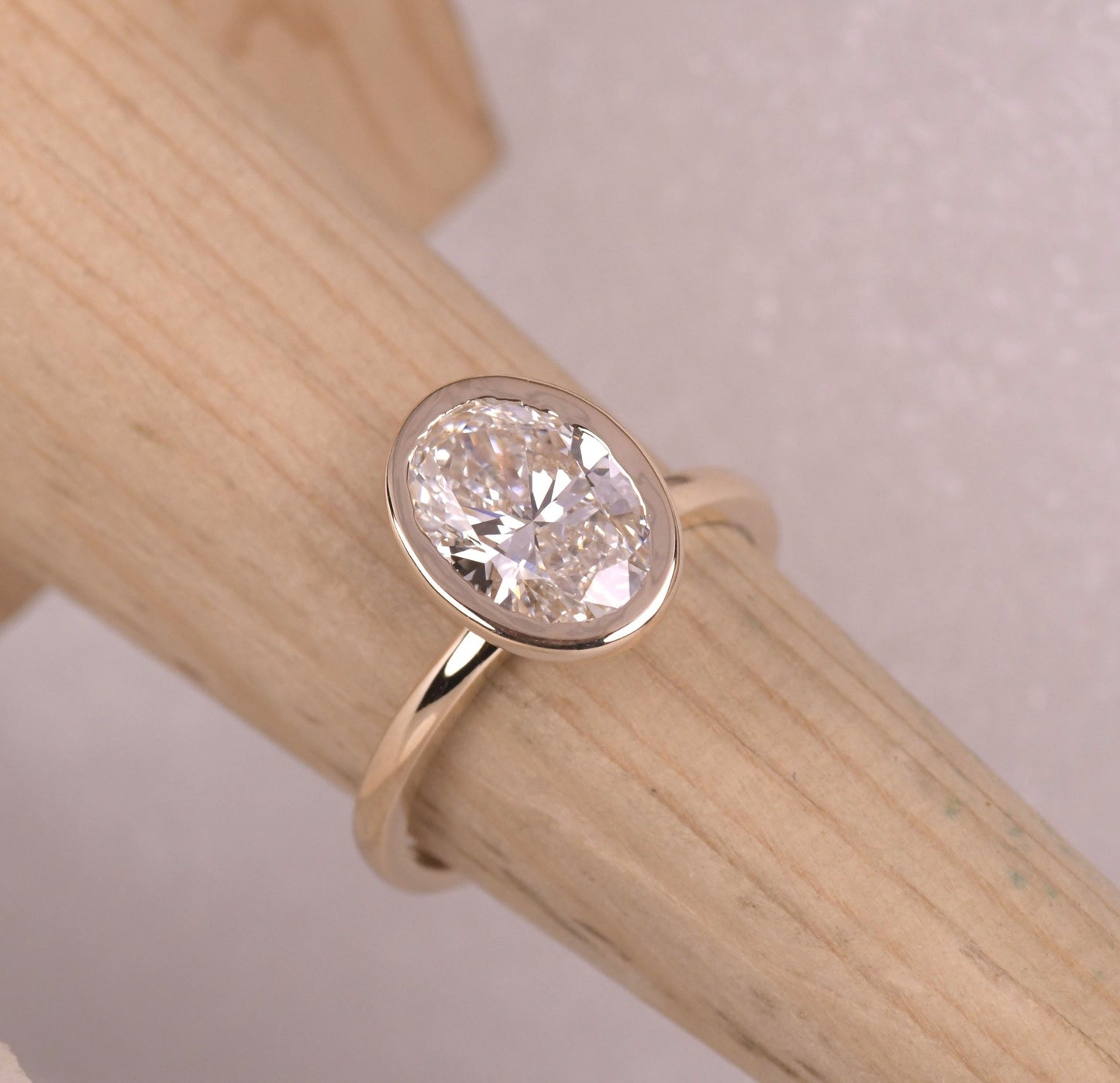 Bezel Set Oval Cut Lab Diamond Engagement Ring