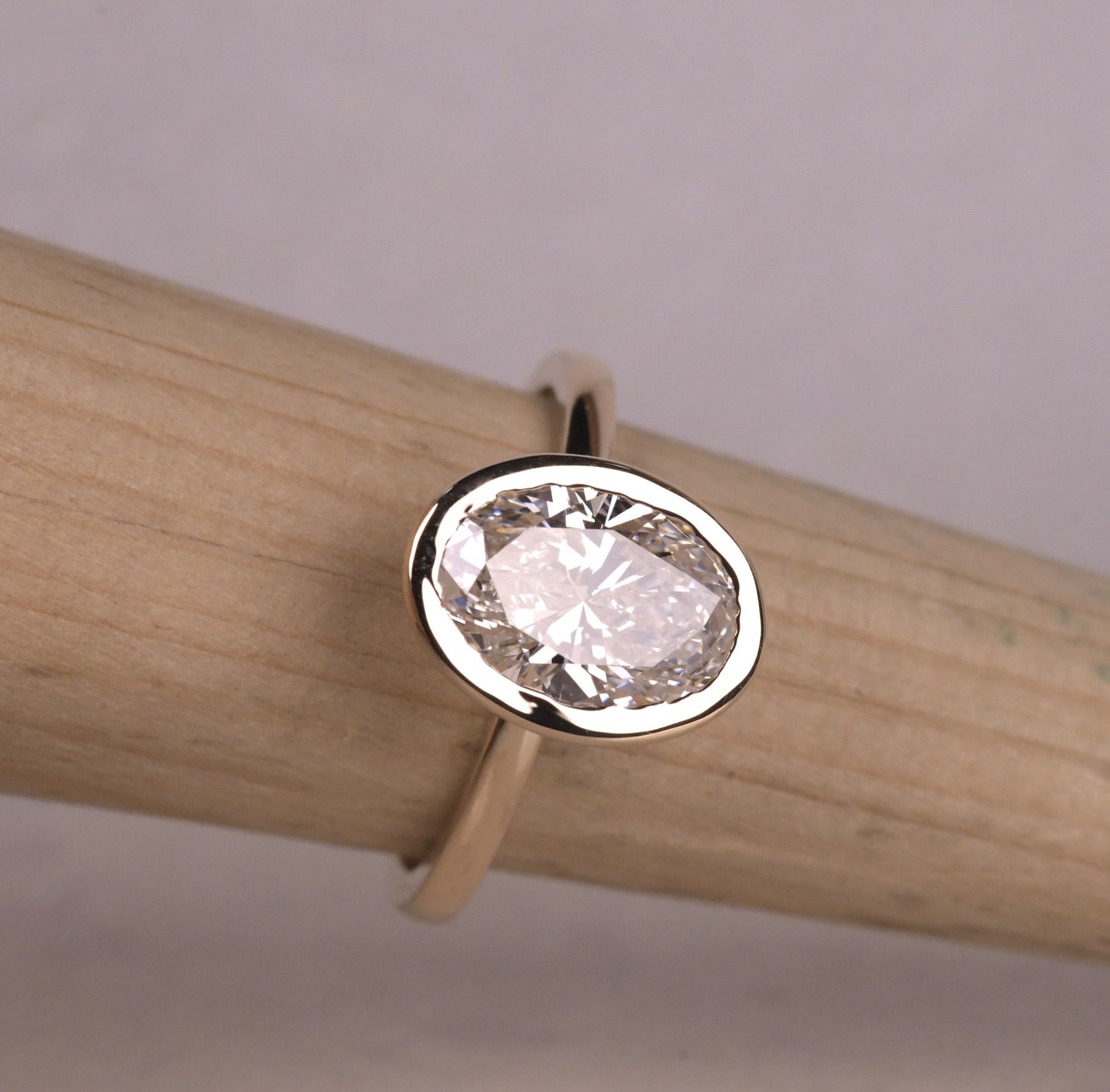 Bezel Set Oval Cut Lab Diamond Engagement Ring