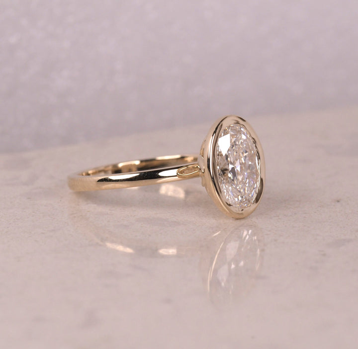 Bezel Set Oval Cut Lab Diamond Engagement Ring