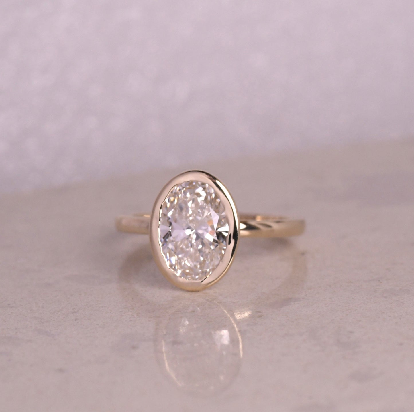 Bezel Set Oval Cut Lab Diamond Engagement Ring