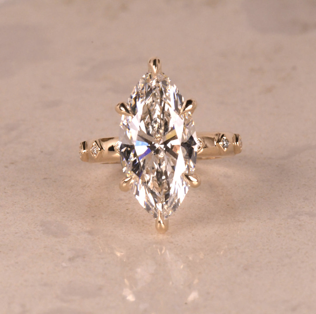 Solitaire Marquise Hidden Halo Ring