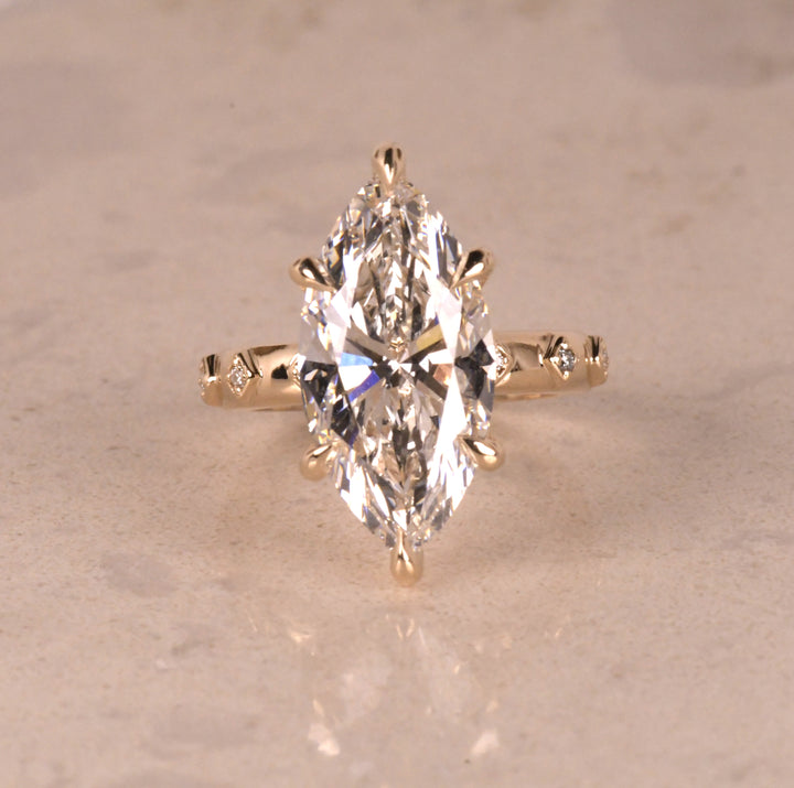 Solitaire Marquise Hidden Halo Ring