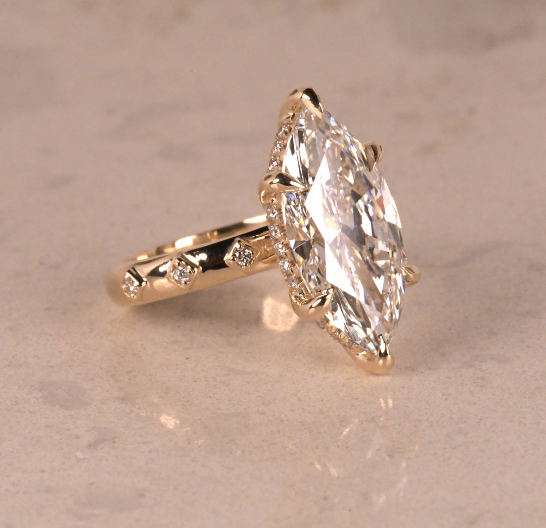 Solitaire Marquise Hidden Halo Ring
