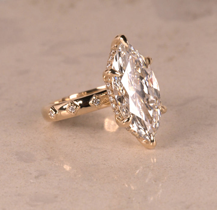 Solitaire Marquise Hidden Halo Ring