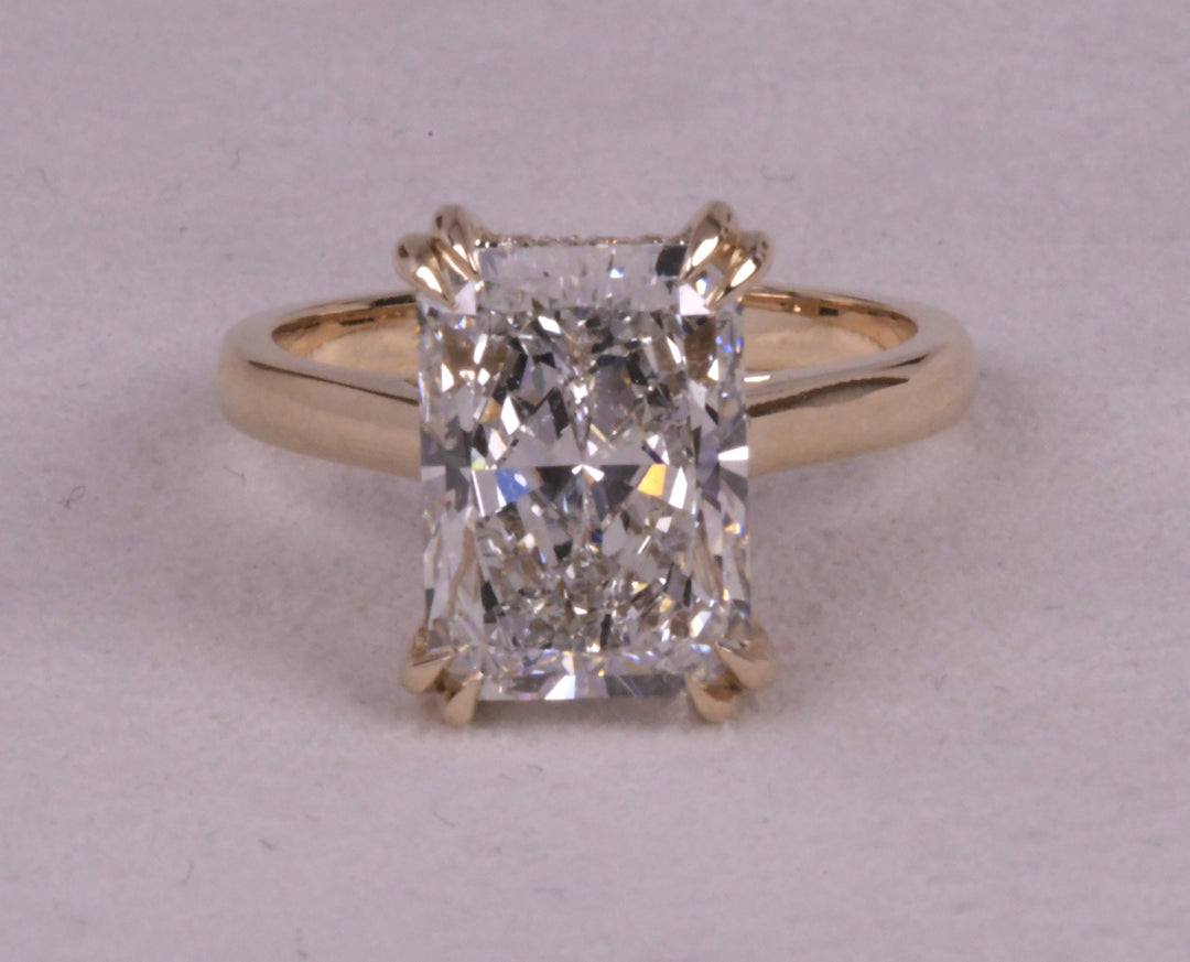 Emerald Cut Hidden Halo Diamond Ring