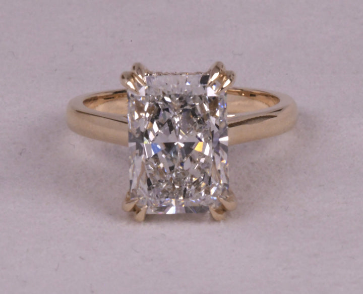 Emerald Cut Hidden Halo Diamond Ring