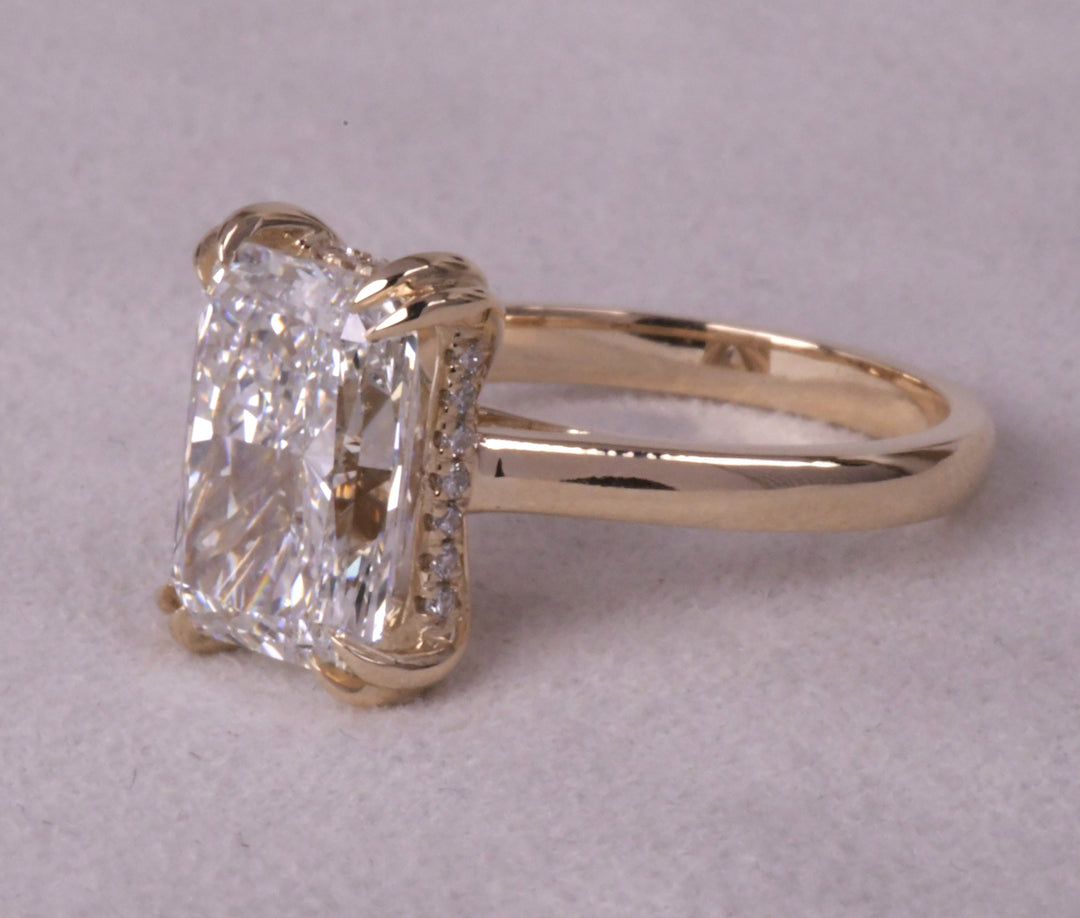 Emerald Cut Hidden Halo Diamond Ring