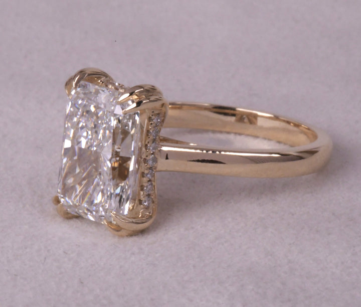 Emerald Cut Hidden Halo Diamond Ring