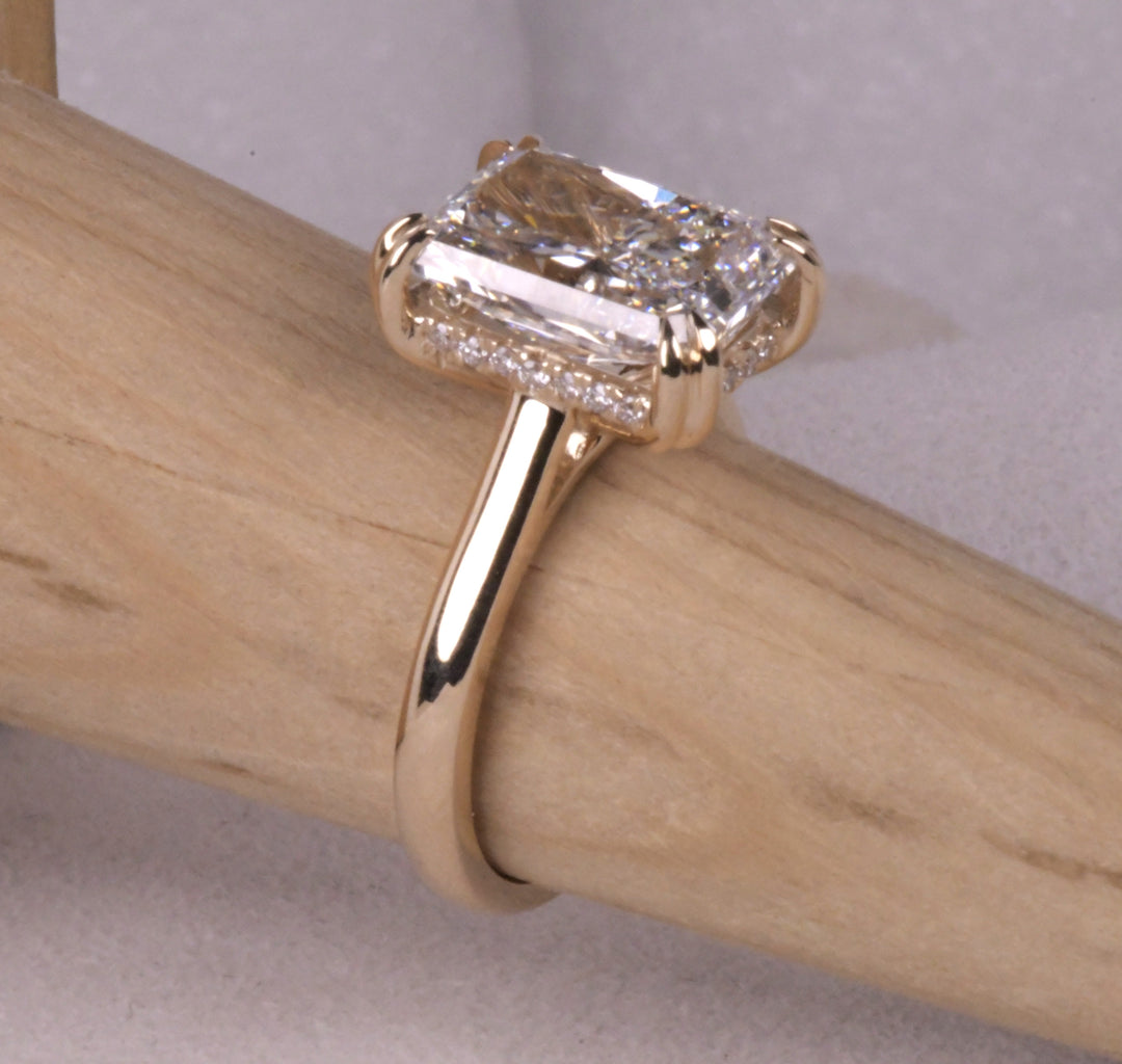 Emerald Cut Hidden Halo Diamond Ring